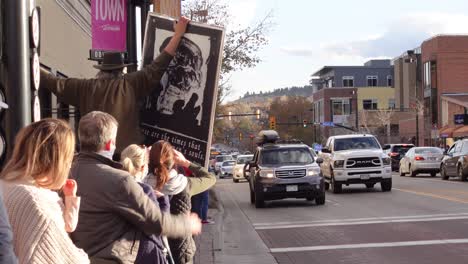 People-celebrating-Joe-Biden's-election-victory-in-the-streets-of-Boulder,-Colorado