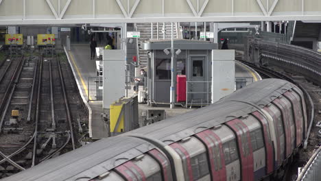 People-ignore-social-distancing-as-they-exit-an-Underground-train-after-it-has-pulled-into-a-station-during-the-Coronavirus-outbreak