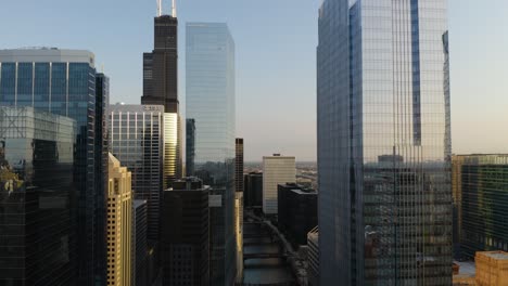 Drone-Flies-Between-Skyscrapers-in-Downtown-Chicago,-Illinois