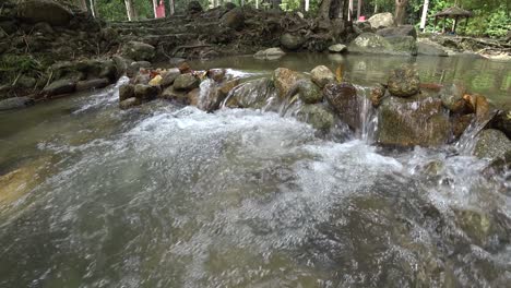 Very-relaxing-tropical-water-stream-at-Ulu-Bendul,-Malaysia,-Negeri-Sembilan