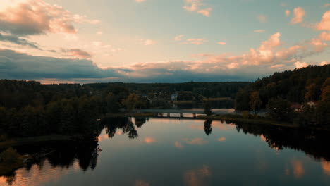Panoramic-View-Of-Tleń-With-Calm-Water-and-Trees---Aerial-Shot