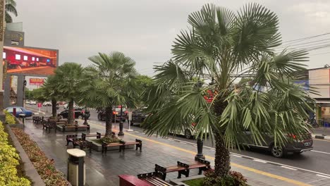 Busy-Traffic-on-Wet-Streets-of-Yogyakarta,-Java-Island,-Indonesia