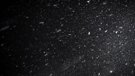 A-dense-blizzard-snowstorm-VFX-insert-in-slow-motion-on-black-screen