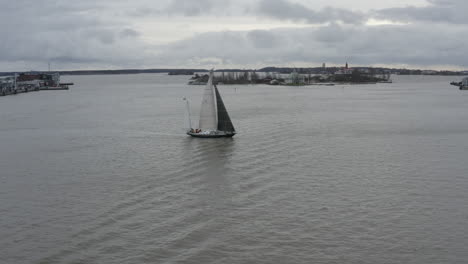 Drone-footage-of-boat-sailing-between-islands