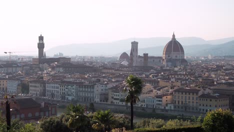 4k-Tourists-admiring-Florence-Firenze-from-Piazzale-Michelangelo-at-sunset,-cityscape-panorama-top-view,-Florence