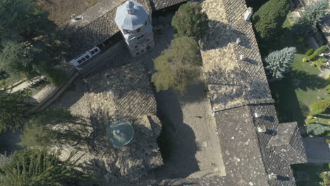 View-over-the-rooftops-of-the-third-largest-Monastery-in-Bulgaria,-aerial-footage