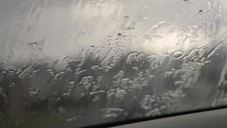 Heavy-rain-on-car-windscreen-in-storm
