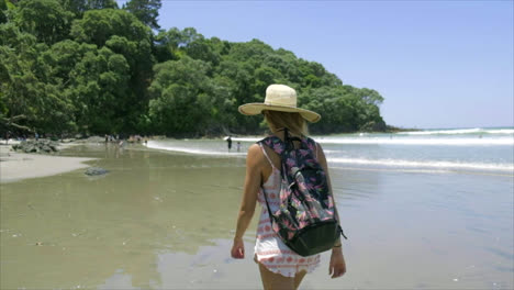Girlfriend-walk-along-waihi-beach-in-New-Zealand