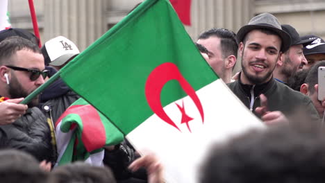 Algerians-in-Trafalgar-Square-film-on-their-phones-during-an-energetic-protest-against-President-Abdelaziz-Bouteflika-standing-for-a-fifth-term