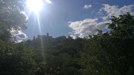 Famous-Wartburg-castle-shot-through-the-trees-in-Eisenach,-Germany