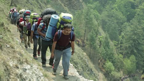 Trekkers-go-on-the-trail-in-the-Himalayan-mountains