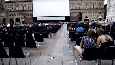 Bologna,-Italy-Maggiore-square-is-all-set-up-for-the-Cinema-under-the-Stars-with-the-screen-and-chairs