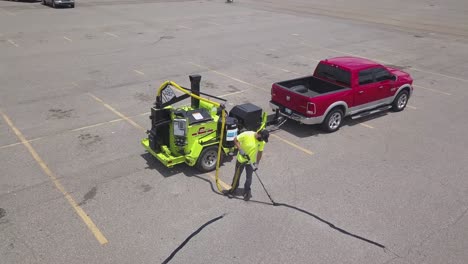 Crack-Sealing-Pavement-With-Wand-Aerial-View