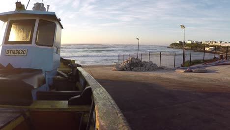 Local-fishing-boats-in-Arniston-await-an-opportunity-to-go-out-on-an-early-winter-morning