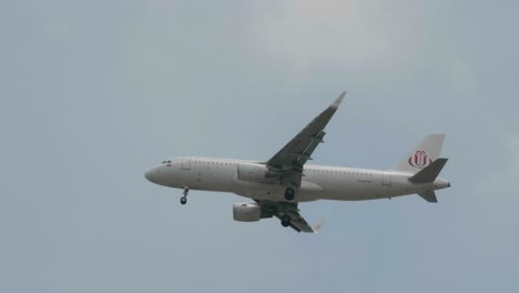 JC-Airlines-Airbus-A320-214-XU-998-approaching-before-landing-to-Suvarnabhumi-airport-in-Bangkok-at-Thailand