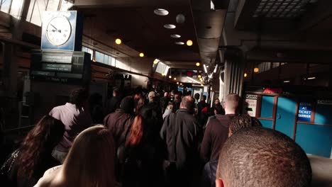 Big-crowd-of-commuters-walking-out-of-Uxbridge-station-on-the-Metropolitan-Line-in-London-during-rush-hour