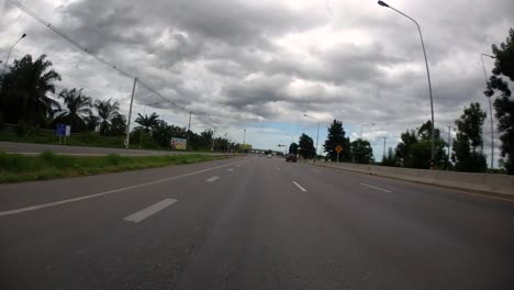 This-is-a-time-lapse-with-an-action-camera-mounted-in-front-of-the-truck,-driving-from-Pranburi-to-Hua-Hin-and-Hua-Hin-to-Bangkok-on-Phet-Kasem-Road