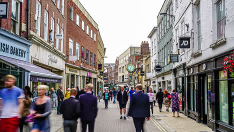 York,-Yorkshire,-United-Kingdom,-circa-:-Tourists-visiting-and-shopping-in-Stonegate-street-in-York,-UK