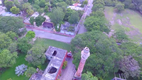 Aerial-view-with-drone-of-the-San-Pedro-Chimay-farm-in-ruins,-which-had-2-chimneys-in-Yucatan