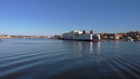 Drone-view-moving-towards-Stena-Line-ferry-,-berthed-in-Gothenburg-in-Sweden