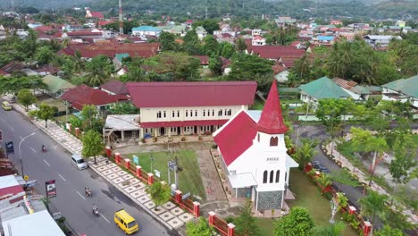 Aerial-over-Old-church-at-Palopo-city,-Aerial-over-PNIEL-Palopo-Church