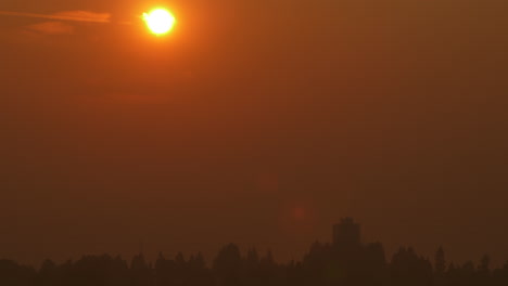 Vancouver-Skyline-And-Bright-Sun-In-The-Sky-Covered-With-Wildfire-Smoke---View-From-The-Neighbourhood-Of-Capitol-Hill-In-Burnaby,-British-Columbia,-Canada---wide-shot