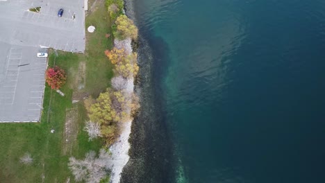 aerial-view-looking-down-at-shoreline--during-fall