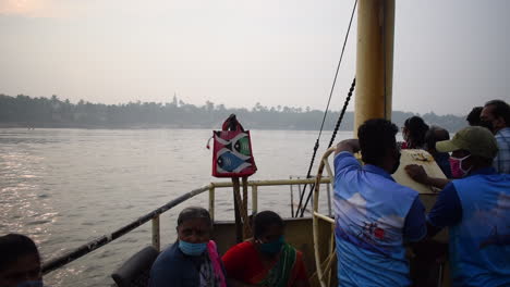 Beautiful-Bay-view-from-a-ferry-boat-sailing-towards-jetty-or-dock-with-sunset-view-video-background-in-prores-422-HQ