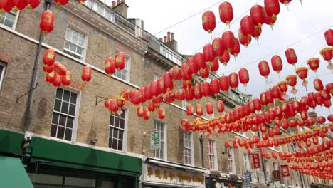 Lockdown-in-London,-China-Town-Chinese-lanterns-hanging-still-in-summer-sun,-during-the-Coronavirus-pandemic-2020