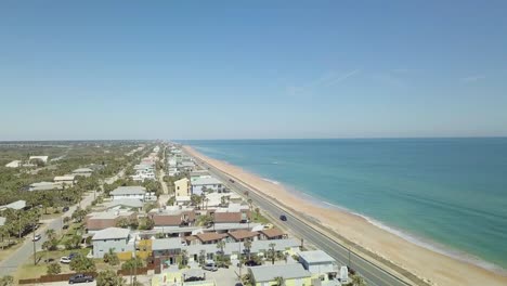 Drone-flying-over-the-coast-of-Flagler-Beach,-Florida