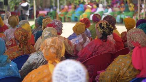 A-large-crowd-of-Filipino-Muslim-women-wearing-colorful-clothing-attend-an-event-celebrating-National-Women's-Month-in-the-Philippines