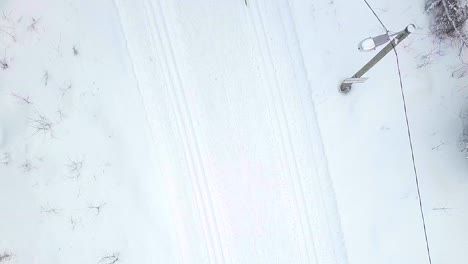 Drone,-top-down-view,-long-distance-skiing