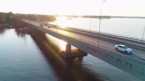 Tracking-aerial-shot-of-a-bridge-in-Helsinki-during-sunset