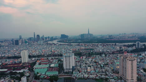 Evening-drone-flight-over-district-7-Ho-Chi-Minh-City-showing-medium-to-high-density-housing-and-Views-to-district-4-and-the-City-Skyline