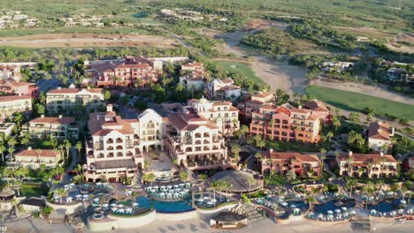 Sheraton-Hotel-resort-on-Mexico-coast,-Baja-California-Sur,-drone-dolly