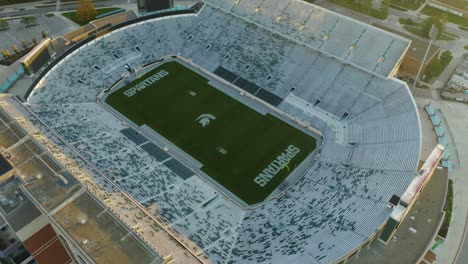Aerial-POI,-empty-american-football-stadium,-Michigan-State-University-Spartans