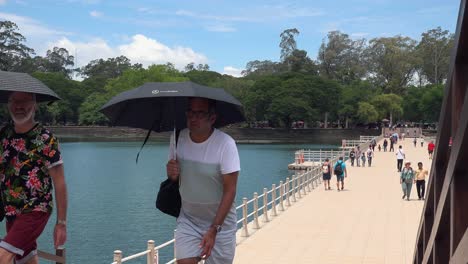 Tourist-Walking-on-Temporary-Angkor-Wat-Bridge