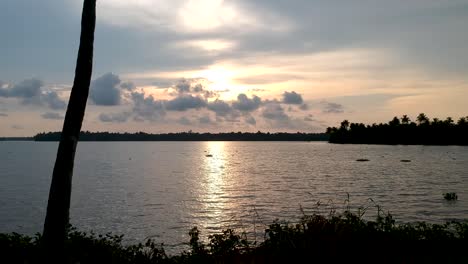 Backwaters-sunset,Silhouette-sunset-in-Vembanad-lake,Sunset-over-Vembanad-Lake
