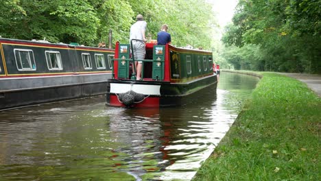 British-canal-boat-holiday-staycation-vessel-navigating-calming-countryside-waterway