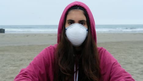 portrait-of-casual-brunette-young-woman-with-Protective-Medical-Face-Mask
