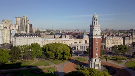 Orbital-shot-of-Torre-Monumental,-Retiro-railway-station-and-Kavanagh-building,-Buenos-Aires