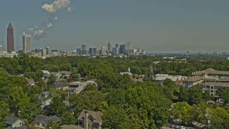 Atlanta-Georgia-Aerial-v703-flyover-shot-of-park,-Old-Forth-Ward-neighborhood-and-skyscrapers-in-midtown---DJI-Inspire-2,-X7,-6k---August-2020