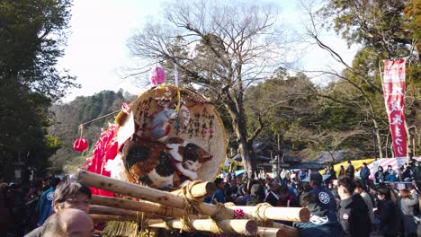 Slow-motion-shot-of-festive-Year-of-the-Rat-designed-Sagicho-Float