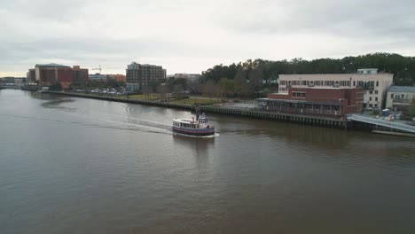 Tugboat-Ferry-in-the-Savannah-River-in-Savannah,-Georgia-USA-on-a-Cloudy-Day