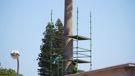 Timelapse-of-construction-workers-building-scaffolding-without-properly-using-the-necessary-work-at-heights-safety-equipment