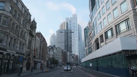 Looking-down-quiet-Liverpool-street-towards-London-skyscrapers-financial-district