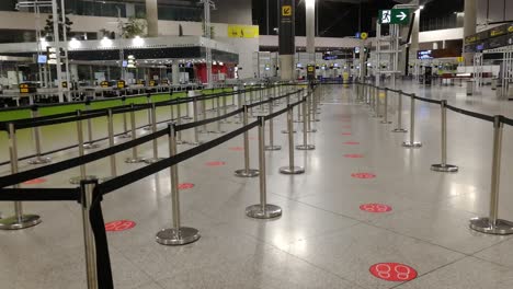 Social-Distancing-Marks-On-The-Floor-At-The-Lounge-Of-Malaga-Airport-In-Spain---Covid-19-New-Normal---static-shot