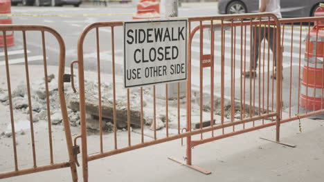 Slow-Motion-Wide-of-a-Closed-Sidewalk-and-Work-Site-in-NYC