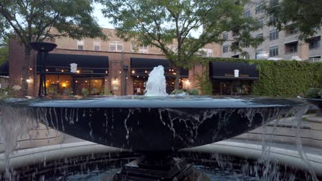 Close-up-of-duplex-fountain-splashing-on-a-fall-evening-afternoon