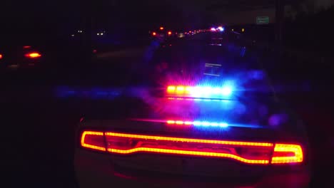 A-beautiful-shot-of-the-rear-of-an-American-emergency-vehicle-at-night